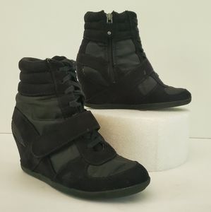 High-heeled sneakers. Used